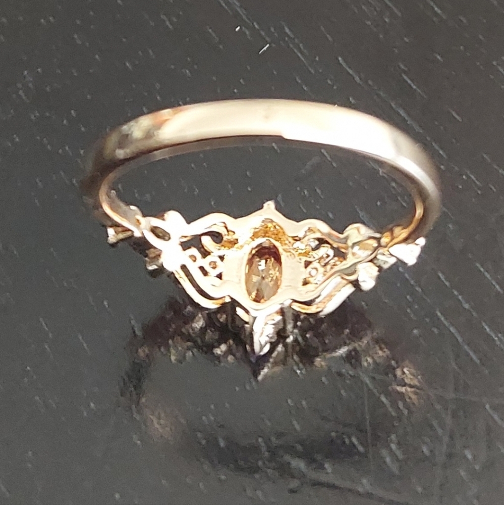 Elegant Gold Ring with Orange Gemstone - Picture 2 of 3